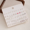 Set mit 20 Paar minimalistischen silbernen Ohrsteckern mit Perlen-, Herz- und Sterndesign - Silberne Sortierte Stile (E0265-1)