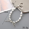 Elegant white faux pearl bag charm with silver bow and heart detail, 15cm length - Silver (K3290)