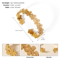 Adjustable golden stainless steel flower cuff bracelet with detailed floral engravings - Exquisite Floral Style (BS-J5569G)
