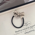 Elastic hair tie with beige marbled acetate bow featuring France Handmade lettering - Black Rope - Marble Beige Black