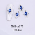 Blue sapphire oval nail charms with silver metal frame and tiny white crystals detail - Silver Base Blue Stone(A177)