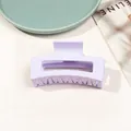 Macro view of lavender purple matte hair claw clip with rectangular cutout and sturdy teeth - 8.5cm Rectangular - Matte Light Purple