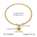 Detail of gold Cuban chain necklace with green zircon heart pendant and toggle clasp - Gold Cuban Chain Necklace With Green Heart Zirconia (HC-N40427)