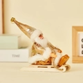 Santa Claus in gold sparkling suit on a wooden sleigh with a bell and rope detail - Sled Style (Gold Crackle)