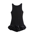 Detail shot of black sleeveless mini dress featuring a tiered ruffle hem and silky texture - XS / Black