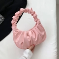 Pink pleated hobo handbag with soft leather texture and elegant ruched handle details - Pink