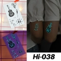 Luminous blue music theme tattoo stickers with guitar and headphone patterns in dark - Hi-038 (Music Elements)