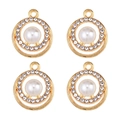 Macro detail of four gold-plated alloy pendants with central pearls and zircon accents - Round Rhinestone Pearl (px1086-15)