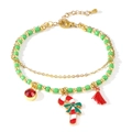 Pulsera navideña hecha a mano con cuentas verdes, dije de bastón de caramelo y borla - Borla Bastón de Caramelo Verde Oro Navidad