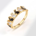 Golden ring featuring a continuous pattern of black and white enamel bunny rabbit heads - Black and White Rabbit (AJ760)