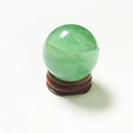Green natural crystal fluorite ball on a wooden base for home and office decor - Fluorite Ball