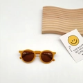 Detail view of cute yellow round frame kids sunglasses with brown anti-UV lenses - Yellow