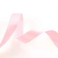 Close-up of pink double-faced satin ribbon with smooth texture and soft glossy finish - Satin / Hot Pink