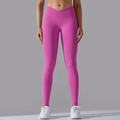 Dettaglio della vita a V incrociata sui leggings da yoga senza cuciture rosa acceso - Taglia S / Pantaloni e gonne / Rosa Rossa