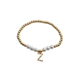 Golden bead and pearl bracelet featuring a colorful zircon inlaid letter Z pendant - Letter Z