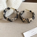 Bohemian black and beige printed fabric hoop earrings with golden metal base finish - White