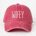 Detailed front view of washed cotton baseball cap with bold WIFEY print in deep red - Watermelon red
