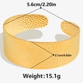 Detail of 18k gold plated stainless steel cuff bracelet with handcrafted hammered texture - Gold