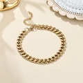 Detalle macro de la pulsera de eslabones cubanos en oro de 18K con cierre de mosquetón ajustable - Eslabón Cubano (2.0x19+5)