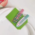 Set of two candy colored striped and checkered hair clips on a green display card - Sea Salt Avocado (2pcs)