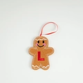 Gingerbread man felt ornament with red embroidered letter L and pink blush cheeks - Letter L