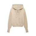 Detail of beige knit hoodie featuring V-neck zipper, drawstring hood and ribbed cuffs - S / Apricot