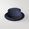 Classic dark blue pork pie hat with black decorative ribbon band in a premium felt finish - 57cm / Cyan