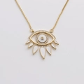 Detail van gouden boze oog hanger ketting met witte emaille druppels en ketting - Wit