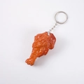 Realistic roasted chicken wing keychain charm made of durable PVC with silver metal ring - Orleans Chicken Leg (Keychain)