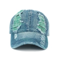 Detail of blue distressed denim cap with vintage ripped texture and green fabric lining - Adjustable / Light Blue