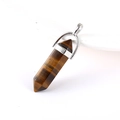Hexagonal tiger eye crystal point pendant with a minimalist silver metal clasp - Tiger's Eye