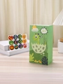 Grüne Dino-Geschenktüte aus Papier mit T-Rex-Motiv und 12 passenden runden Aufklebern - T-Rex / Hellgrün