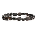 Macro detail of irregular obsidian stone beads on a polished minimalist gemstone bracelet - Silver Obsidian