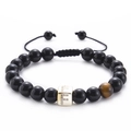 Detailed view of black onyx beads and tiger eye stone with golden micro-set zircon letter F - Letter F-Black Agate Bracelet