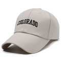 Beige cotton baseball cap with black Colorado embroidery and curved brim in 45-degree view - One Size(Adjustable) / Light Beige