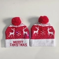 Red Christmas LED beanie with reindeer patterns and festive white snowflakes - Double Reindeer White Folded Red Letters Hat