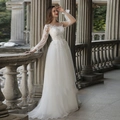 Elegant white long sleeve lace wedding dress with floor-length sheer tulle princess skirt - US 2 / White Floor Length