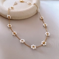 Elegant gold chain necklace featuring delicate pearl flower motifs in a vintage style - Gold Fine Chain Pearl Five-petal Flower Necklace