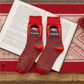 Red and green striped Christmas socks featuring a cute Chinese God of Wealth character - Prosperous Wealth