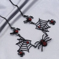 Gothic black spider web choker necklace with red rhinestones on grey silk background - Black