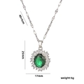 Silver necklace featuring an oval green crystal pendant with clear cubic zirconia trim - 577 Silver Green Zircon Necklace