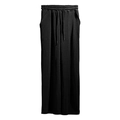 Detalle de pantalones negros de pernera ancha con textura acanalada y cordón ajustable - S / Negro