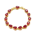 Macro detail of gold-plated bridal bracelet featuring vivid red pear-cut cubic zirconia stones - 24K Gold Plated Red