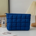 Royal blue quilted puffer cosmetic bag with zipper closure for makeup storage - Blue