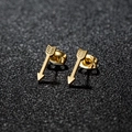 Minimalist golden cupid arrow stud earrings with polished finish on black textured surface - Arrow / Gold