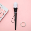 Creative rocket-shaped stress relief gel pen with black lanyard on pink background - Rocket Jumping Pen/White