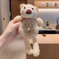 Cute beige plush teddy bear hair scrunchie for kids with soft fuzzy texture and cute dangling legs - Apricot Bear Hair Tie
