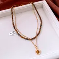 Detail of 18K gold plated tiger eye stone pendant and beaded double-layer necklace - Brown Tiger Eye Double Layer Necklace Set / Brown