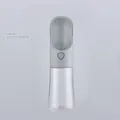 Portable pet water bottle in gray finish with ergonomic drinking trough and control button - Gentleman Gray Water Style / With Rabbit Ear Decoration