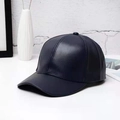 Close-up of premium dark blue PU leather texture on a minimalist baseball cap - Adjustable / Navy Blue